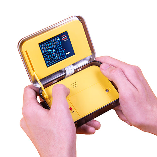 1933-Pac-Man-in-a-Tin-in-hand-1x1-1