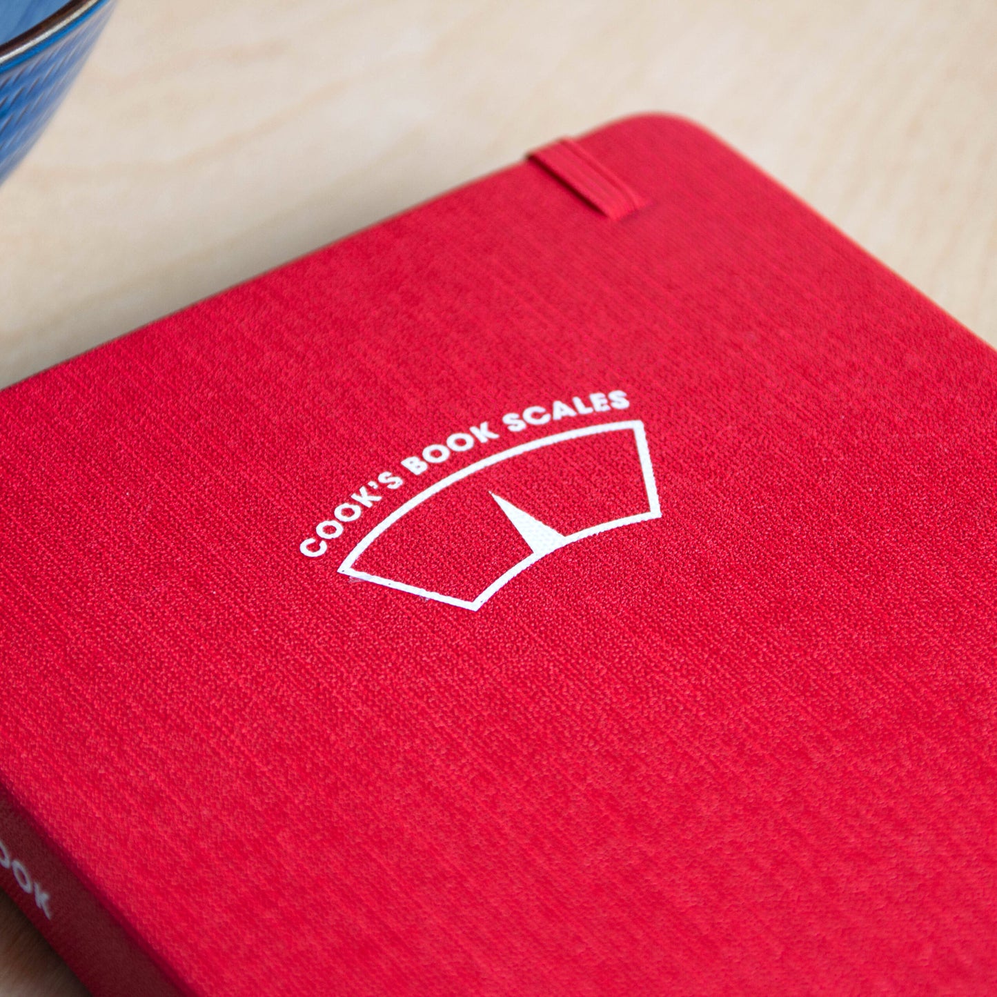 80710_cook-book-scales-front-cover-logo-close-up