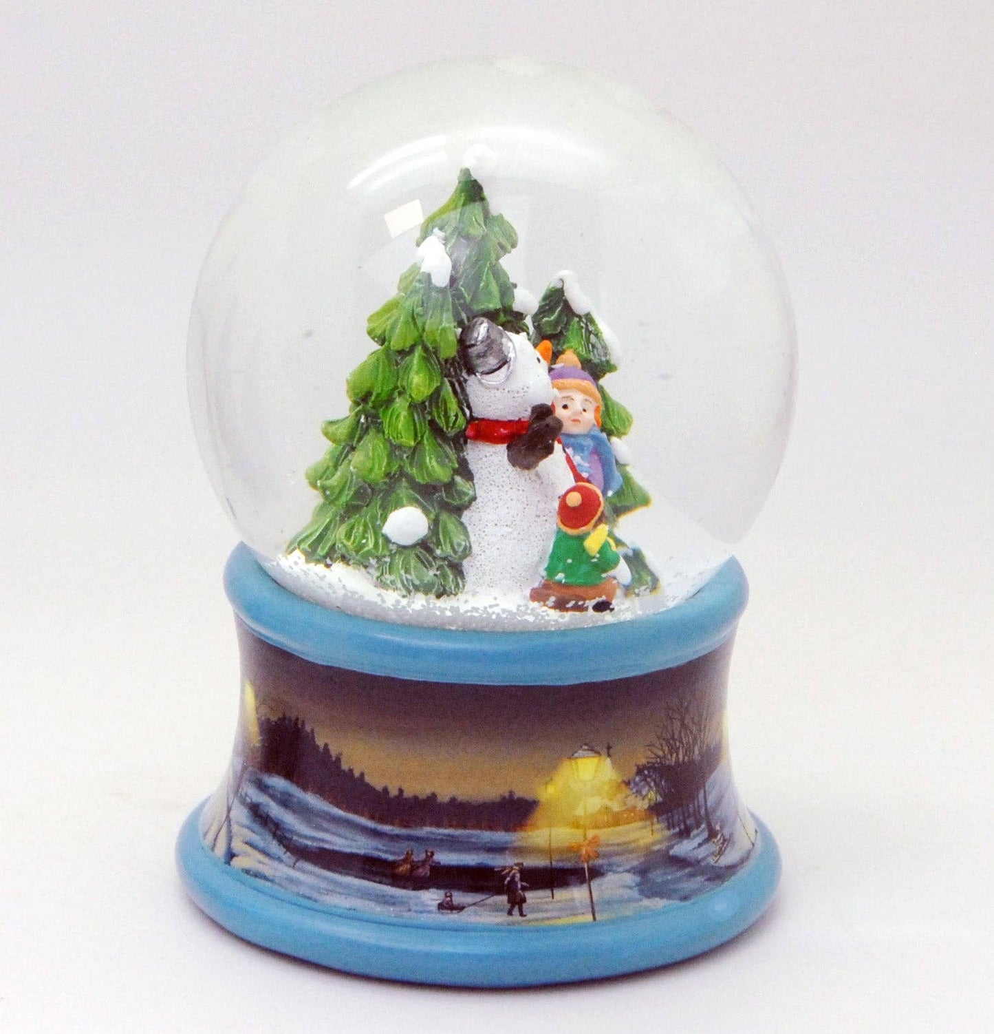 Bola de nieve para niños construyen un muñeco de nieve sobre un pedestal, paisaje invernal, patinador sobre hielo, azul, con caja de música de 10 cm de diámetro