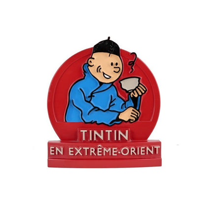 Stèle Lotus Bleu Tintin prenant le thé